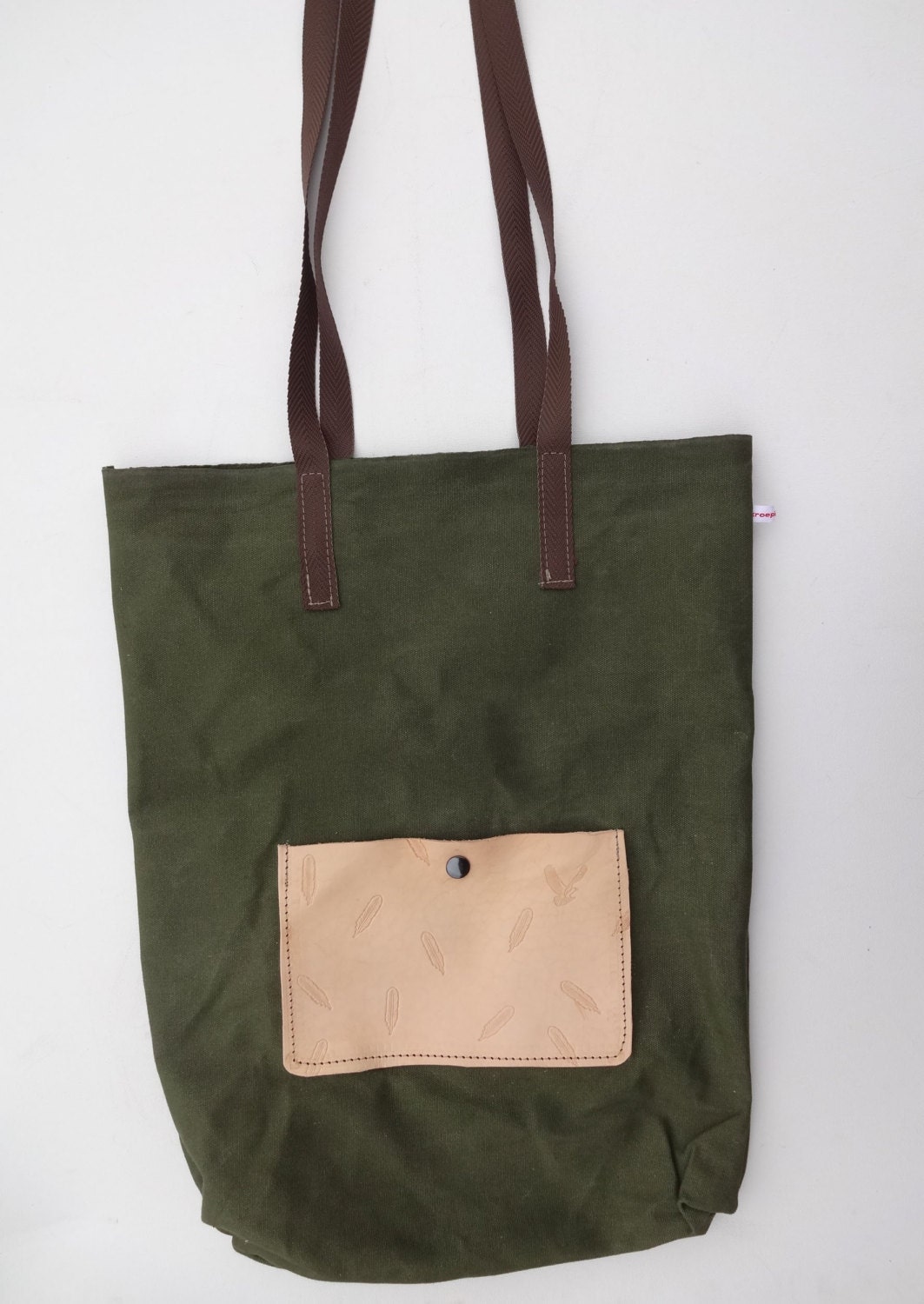 canvas tote leather feather pocket