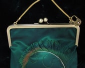 VICTORIAN HANDBAG in Iridescent Dark Green Taffeta Embellished with a Curled Peacock Sword Feather, Chain Handle and Handbag Charm