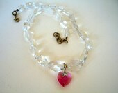 Necklace with Crystal Quartz semiprecious stones and rose Swarovski crystal heart  pendant.