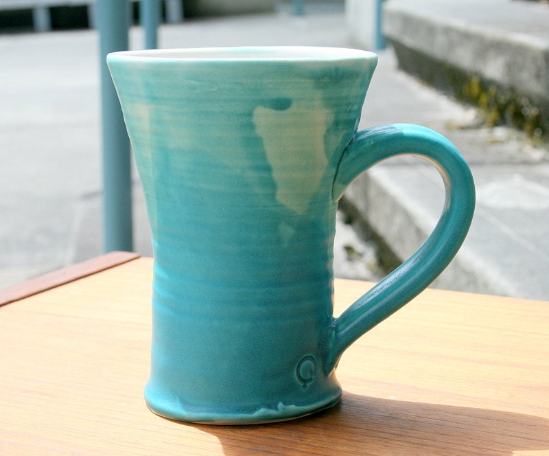 White and turquoise big porcelain ceramic mug, minimal kitchen tableware.