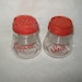 Vintage Glass Salt and Pepper Shakers Red Plastic Lids