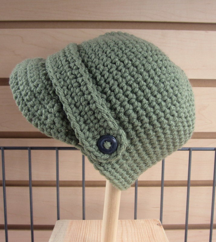 Dark sage green newsboy style hat with button strap