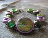 Button Jewelry - button bracelet made with new and vintage buttons in green and purple