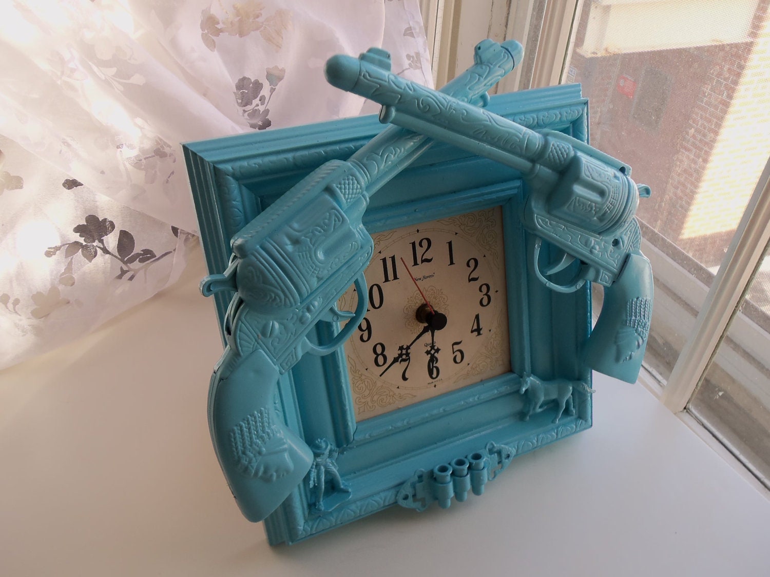 blue cowboy gun clock