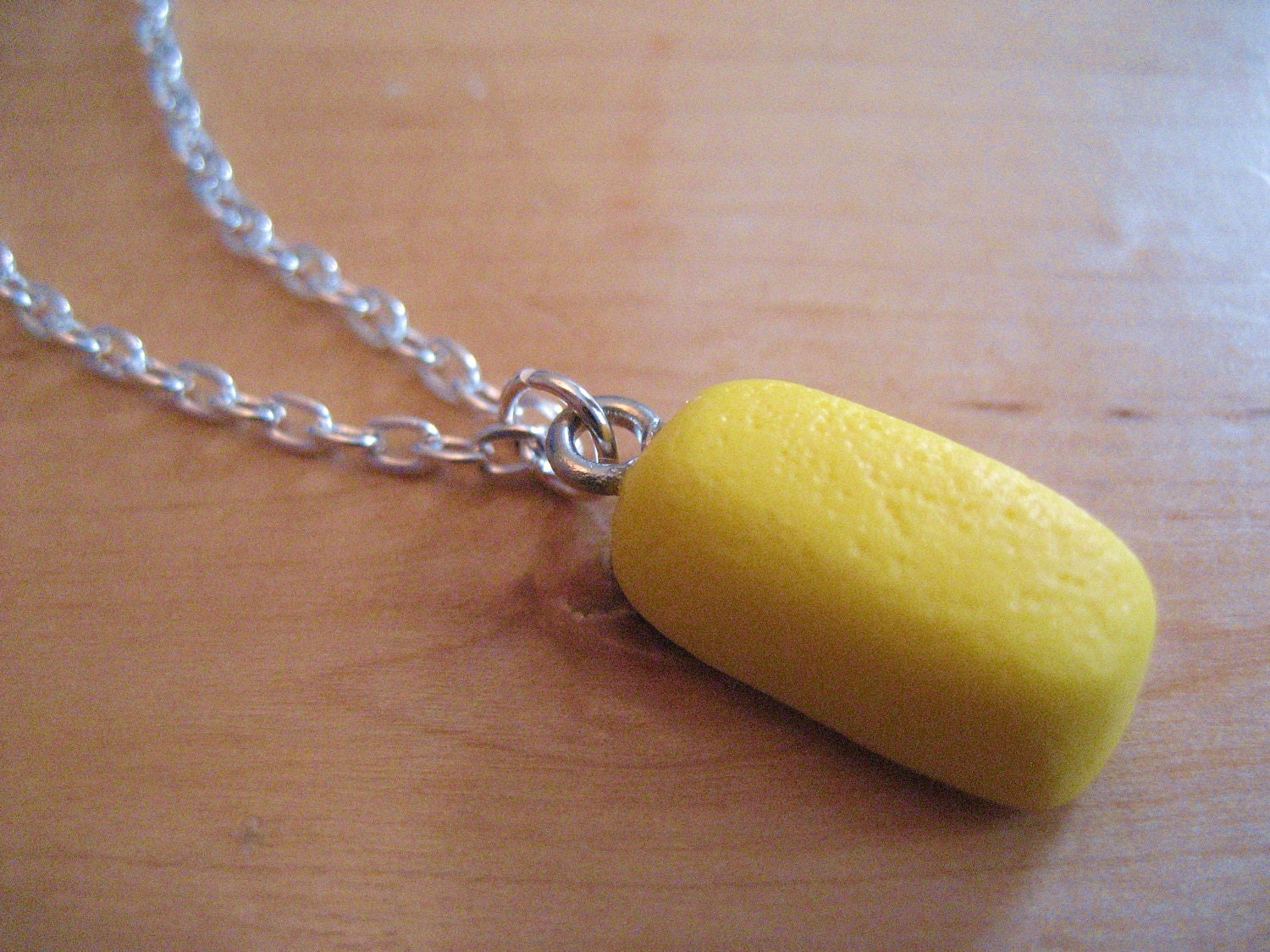 Twinkie snack cake necklace made from polymer clay