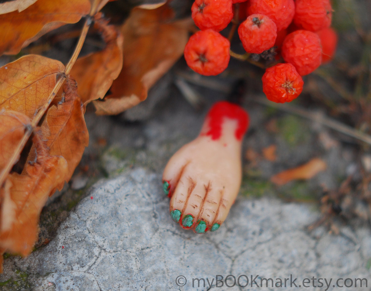 Zombie hand eith minty blue manicure . Earphone dustplug. Miniature bloody plug.  Fits 3.5mm output. turquoise