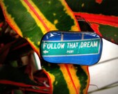 Follow that dream parkway glass necklace. Real street sign in Yankeetown, FL. 
