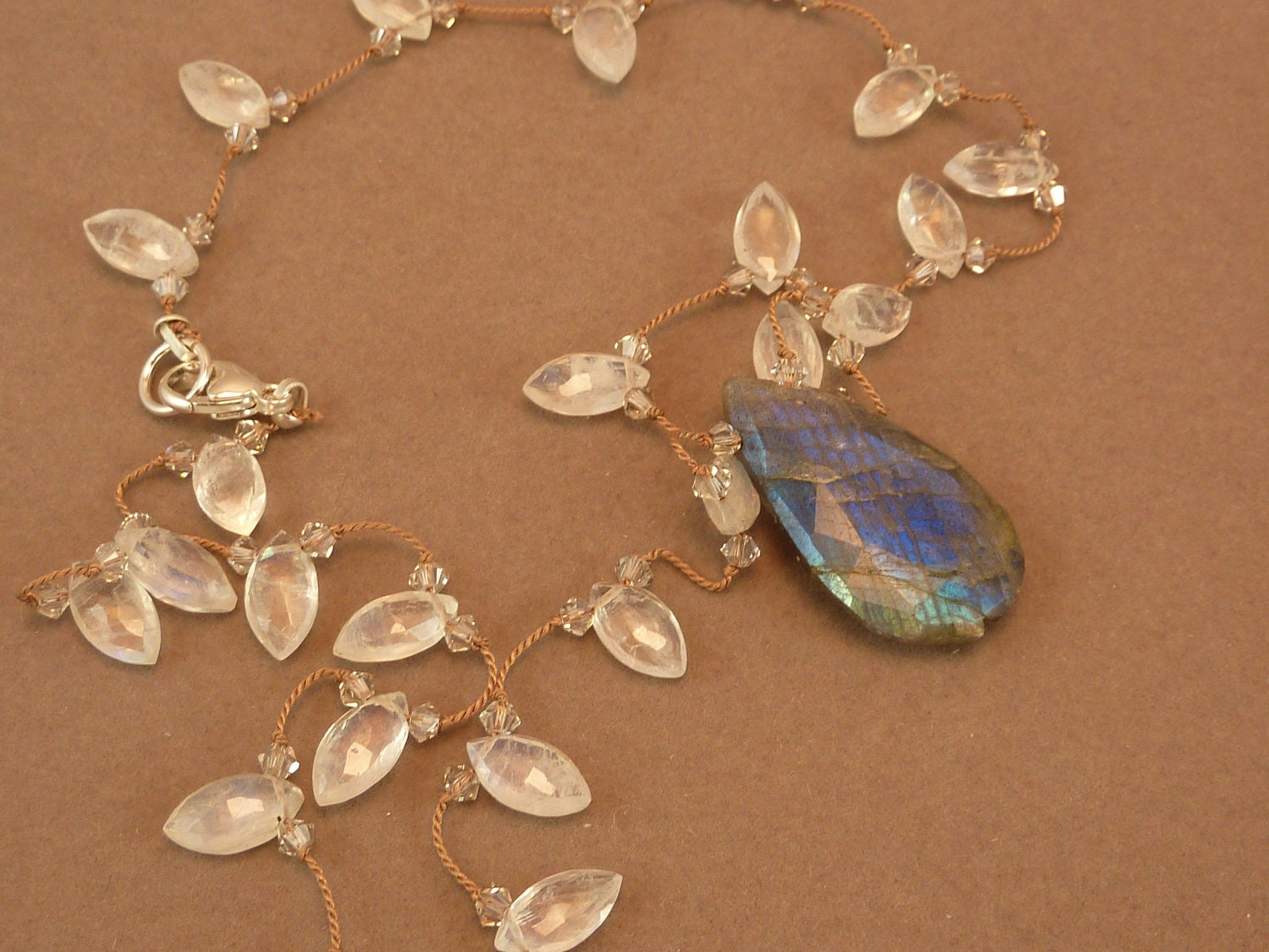 Faceted labradorite pendant necklace with marquise faceted moonstone, hand knotted on silk with crystal and sterling silver