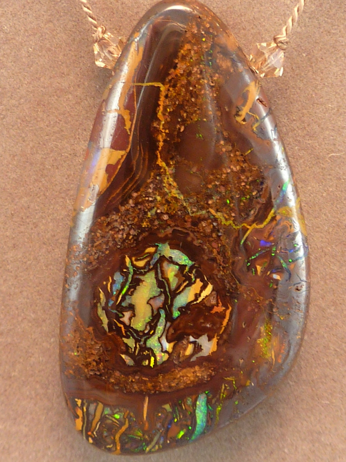 Australian boulder opal pendant necklace with faceted peridot briolettes hand knotted on silk