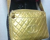 Vintage CHANEL Gold quilted lambskin large CC  bag with a gold tone CC ball charm. Best Chanel for daily use