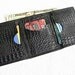 Croc embossed black leather trifold wallet for men.