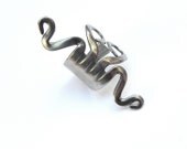 Fork ring. Small bended stainless steel fork