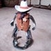 Cowboy Collectable good guy meeting up with the bad guy at high noon.