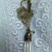 Clear Crystal Quartz Necklace on bronze chain with open front grape toggle