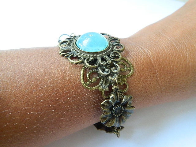 Antique brass bracelet blue moon