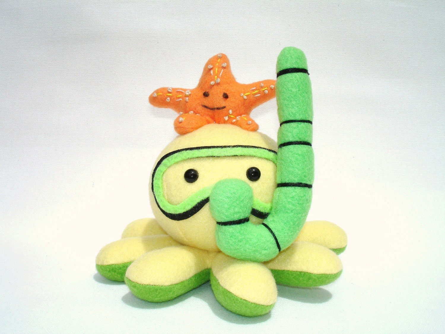 Made-to-order plush octopus toy with snorkel and starfish friend in yellow, green, and orange fleece