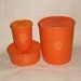 Vintage 70's orange Tupperware canisters (3)