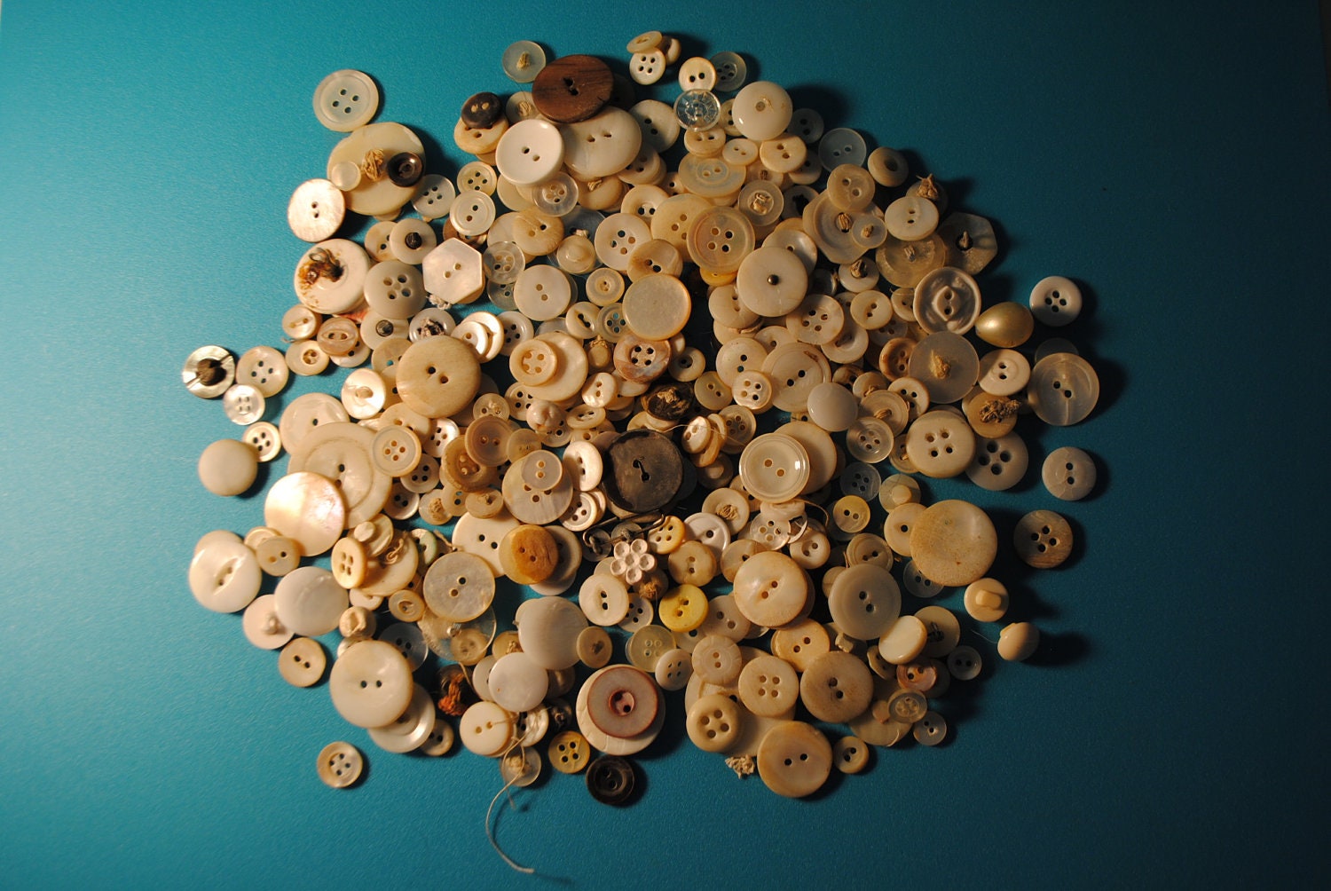 handfuls and handfuls of buttons found at an English estate sale lovely colors white ivory cream MOP Bakelite carved