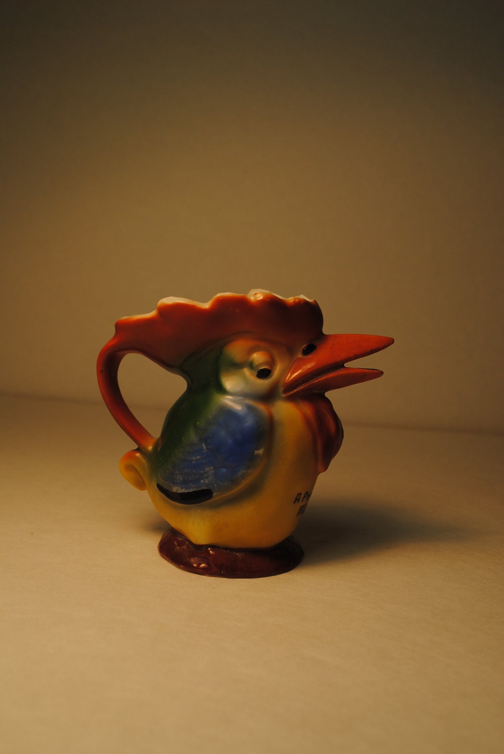antique 1930s IRISH creamer TOUCAN which is associated with Guinness beer a lovley and rare find blue orange yellow
