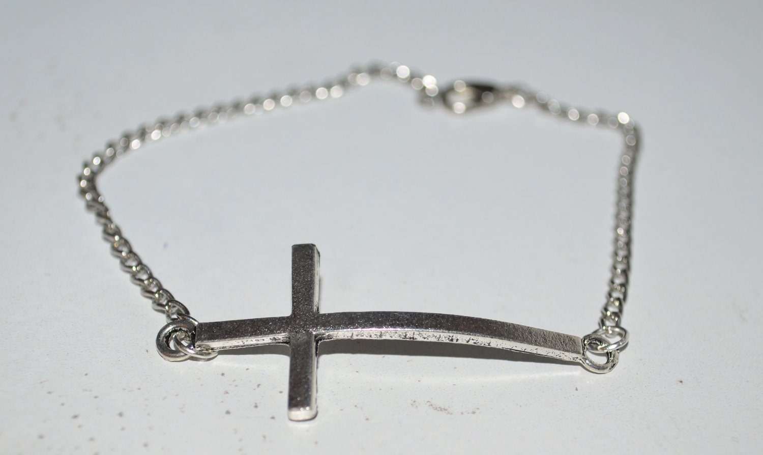 Silver Tone Sideways Cross Bracelet