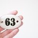 Vintage enamel number sign 63