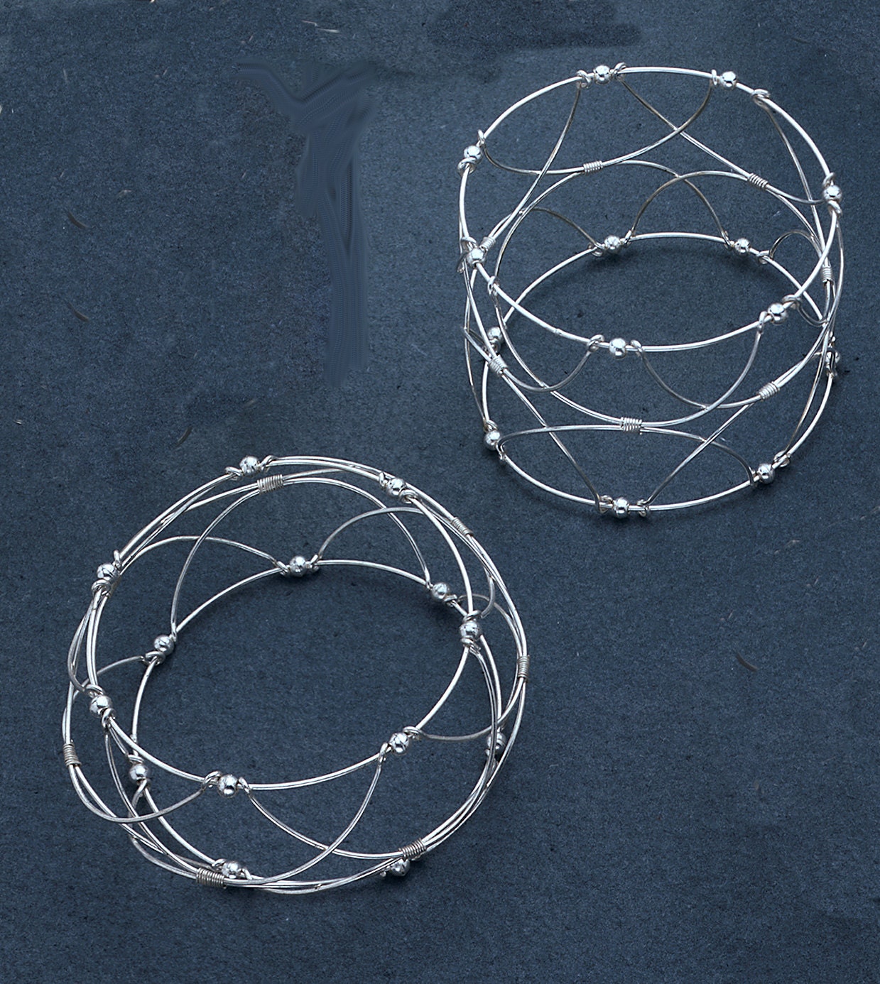Revised Version of the Ancient Egg Holder that is Both a Bracelet or Earrings if you buy 2.