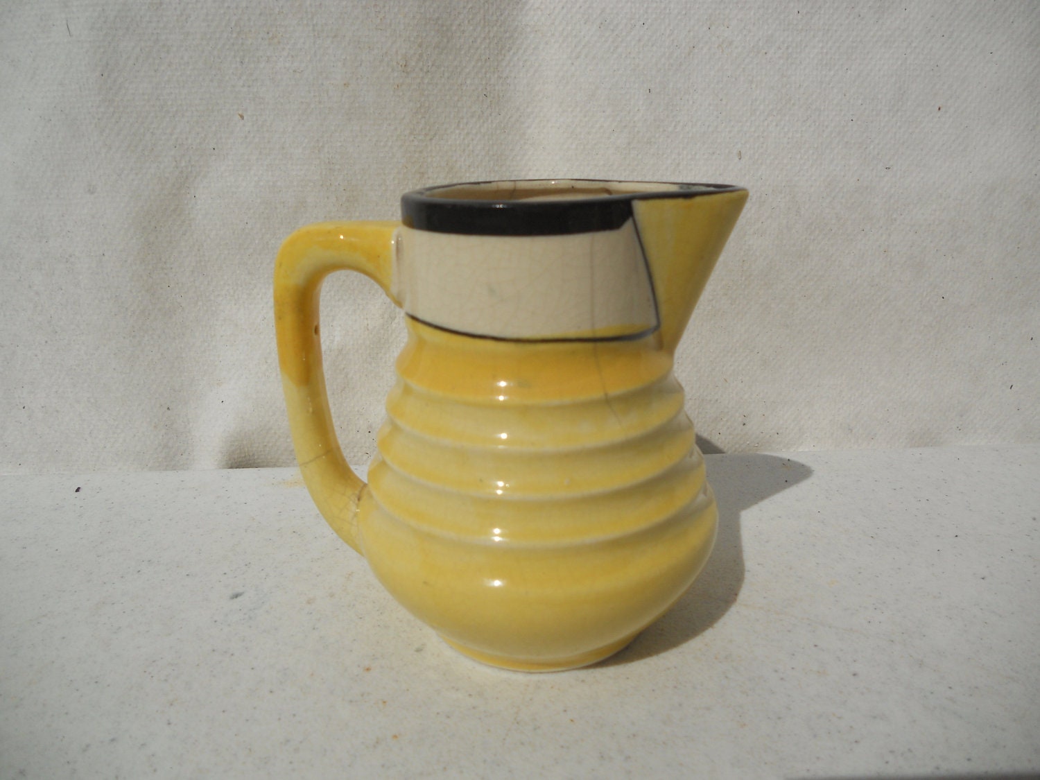 Cute Little Yellow Pitcher