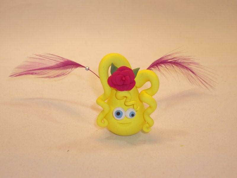Yellow Flower Fairy germ with a hot pink rose