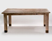 Reclaimed wood dining table with steel leg caps