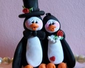 Penguin wedding cake topper.  Handmade polymer clay Penguin couple wedding cake topper and keepsake