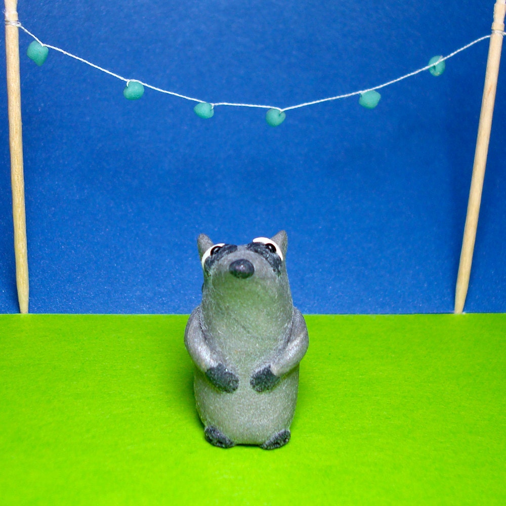 Tiny Raccoon Sculpture