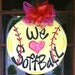 We Love Softball Door Hanger - Bronwyn Hanahan Art