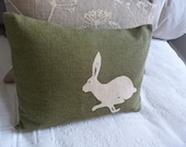 hand printed olive  logo hare cushion