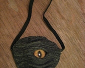 Grichels leather eyepatch - tree bark textured green with honey brown and green slit pupil bobcat eye