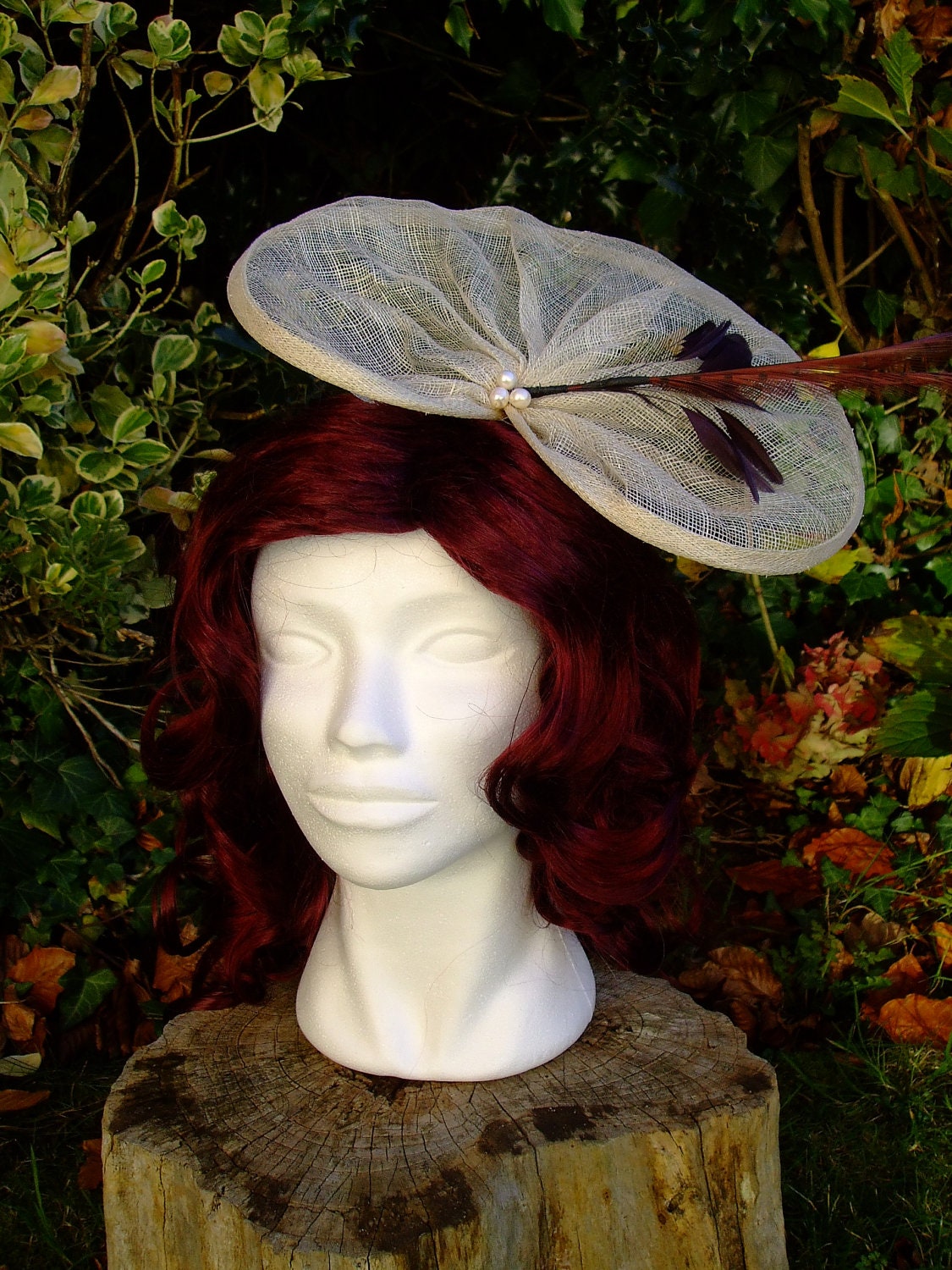 Feather and pearl Orchid fascinator