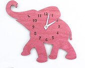 The "Baby Pink Elephant" designer wall mounted clock from LeLuni