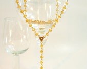 Sparkling Golden Crystal with Gold Skull Extra Long Rosary Style Necklace