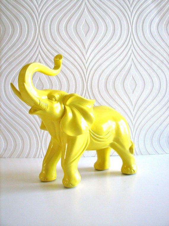 Ollie the fun glossy yellow elephant