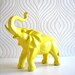 Ollie the fun glossy yellow elephant