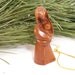 Hand carved mother with child Christmas tree ornament