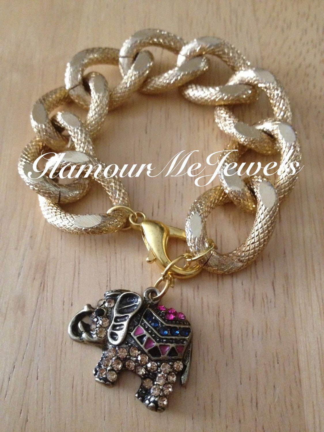 The ELLIE - Textured Gold Chain Bracelet With A Pink & Topaz Rhinestone Elephant Hanging Charm