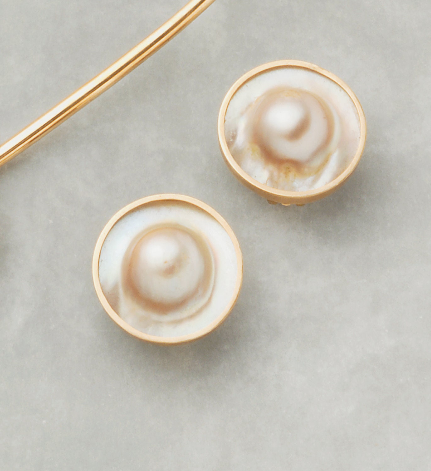 Wonderfully matched Blister Pearl Clip-on earrings framed in thick 14K gold