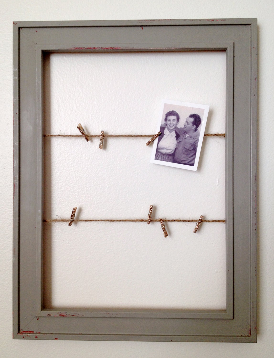 Picture frames with twine and sparkly clothespins by LaPeonyPink