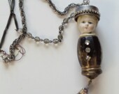 Vintage Frozen Charlotte with Metal Shaker and Tassel Necklace - Rhinestone Rimmed Hat - Assemblage