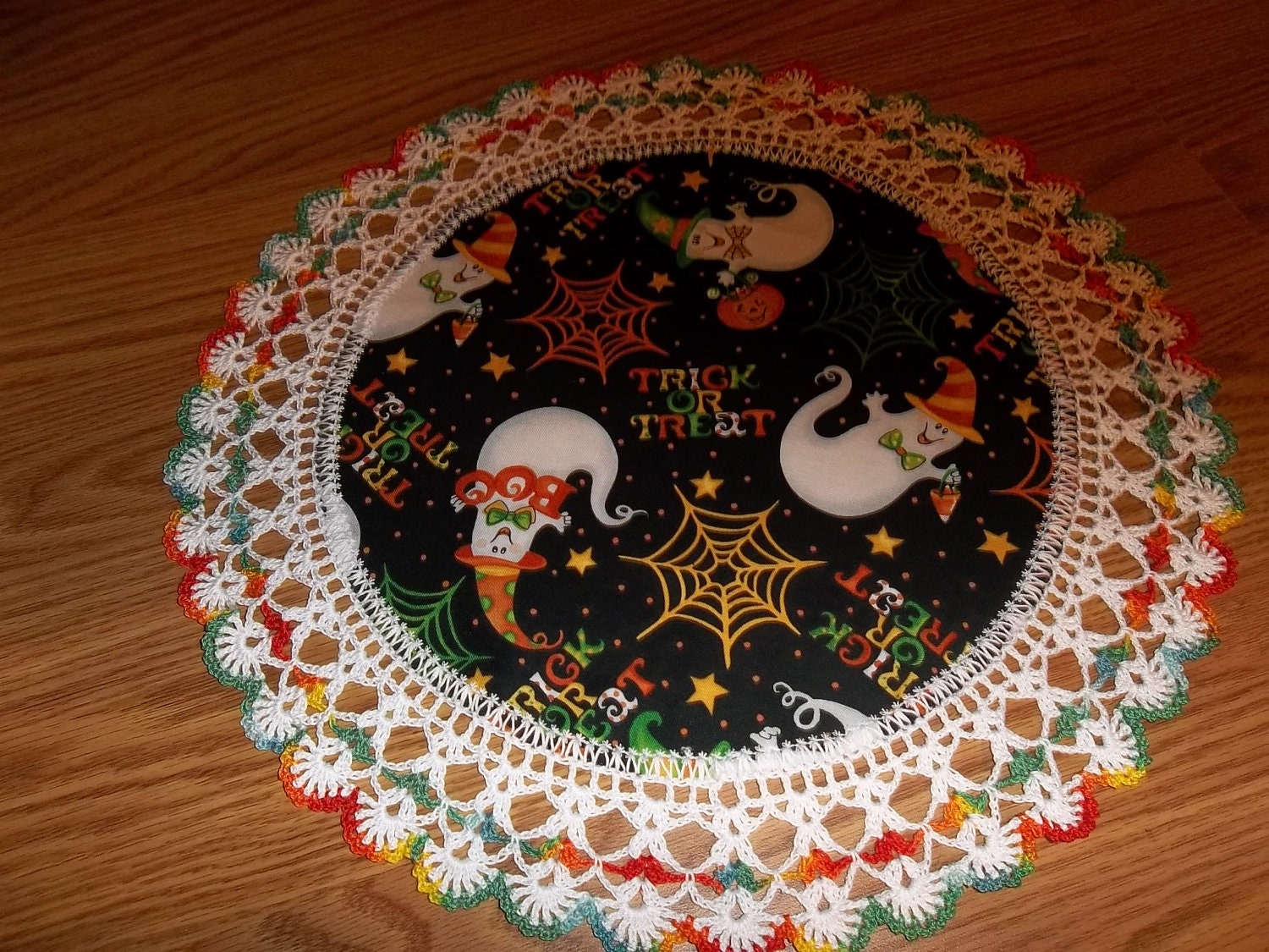 Crocheted Halloween Doily Trick or Treat with Ghosts Fabric Center with Crocheted Edging Medium 18 inches