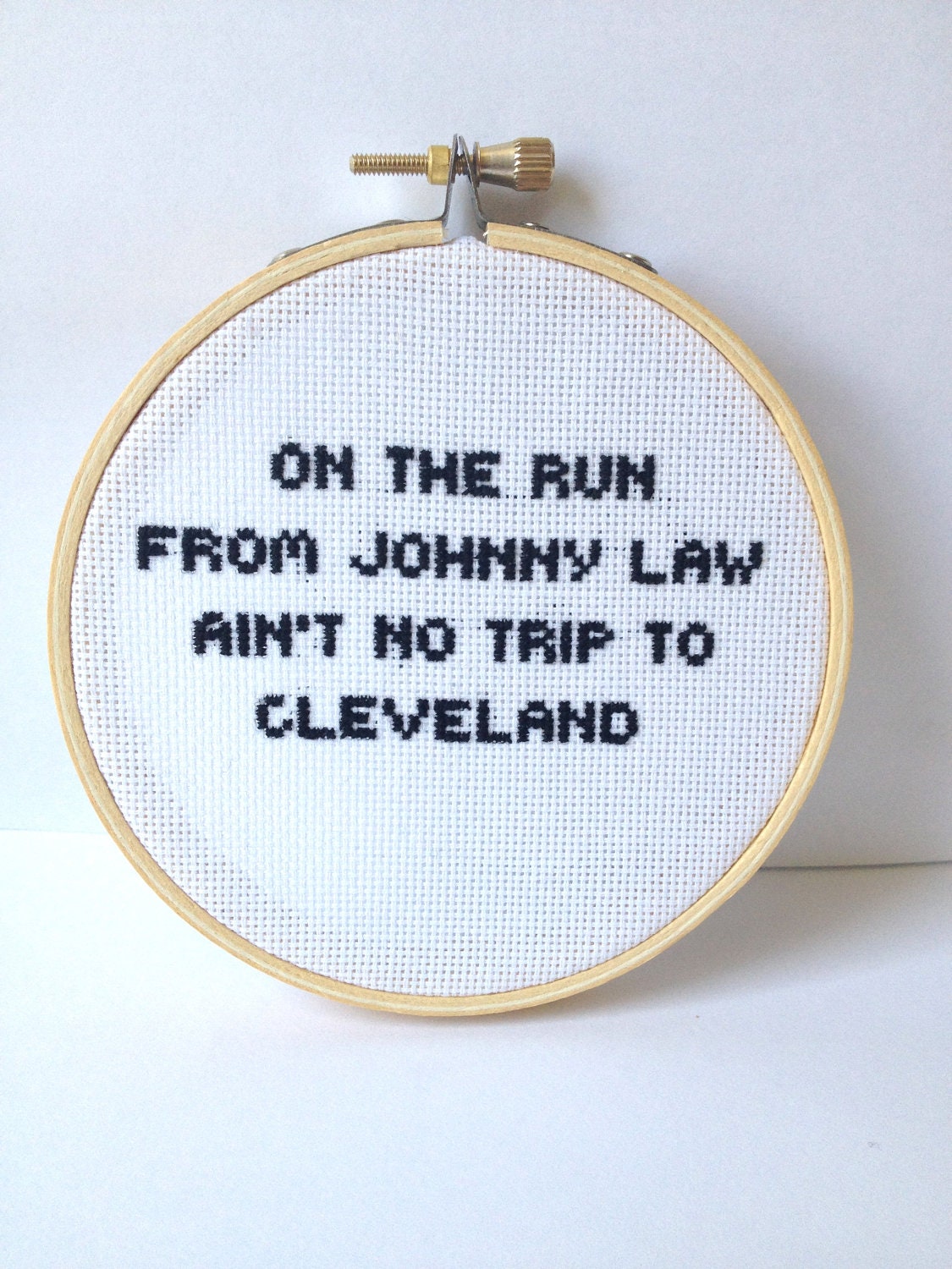 Bottle Rocket Quote Cross Stitch - On the run from Johnny law, ain't no trip to Cleveland. Embroidered Hoop Art
