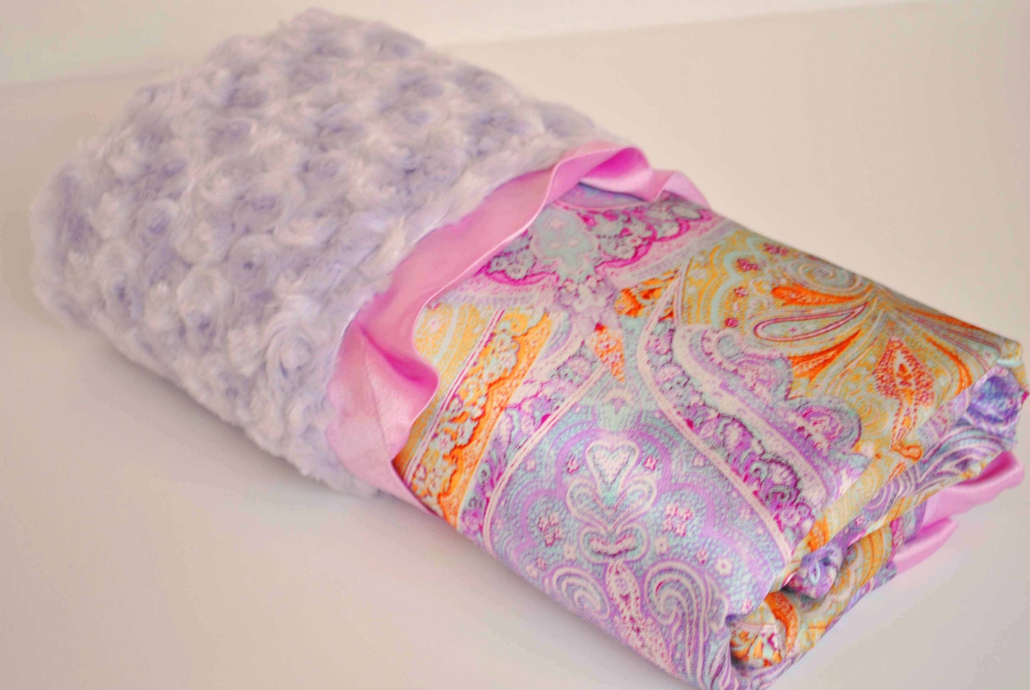 CORALINE  BABY BLANKET......Lavender paisley charmeusse print with lavender minky swirls and satin ruffles.........Modern baby gift