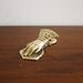 Vintage brass Hand office paper clip
