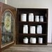 vintage wooden spice cabinet