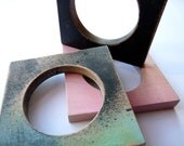 Stack of coloured square bangles